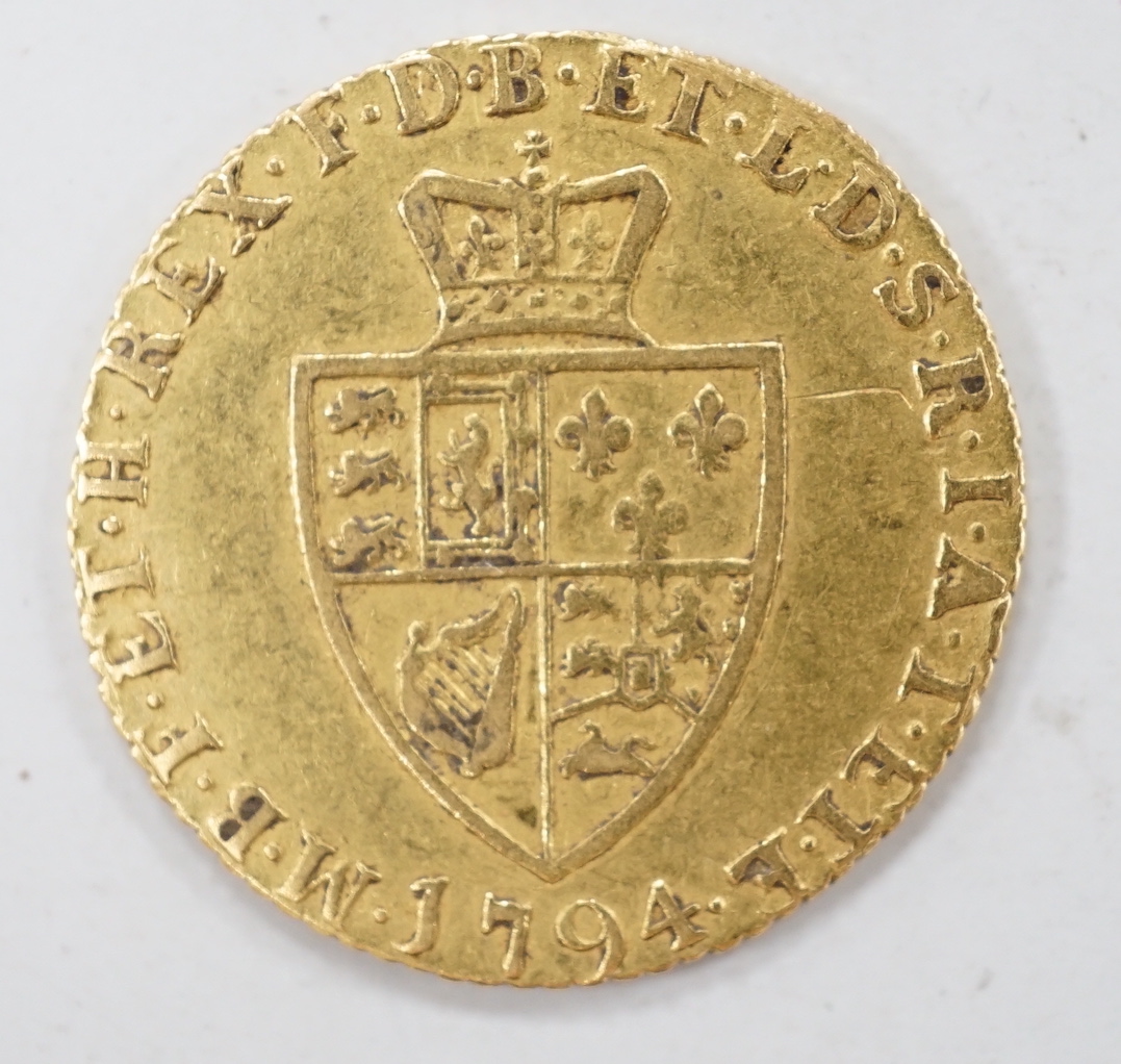 A George III gold half guinea 1794, about F